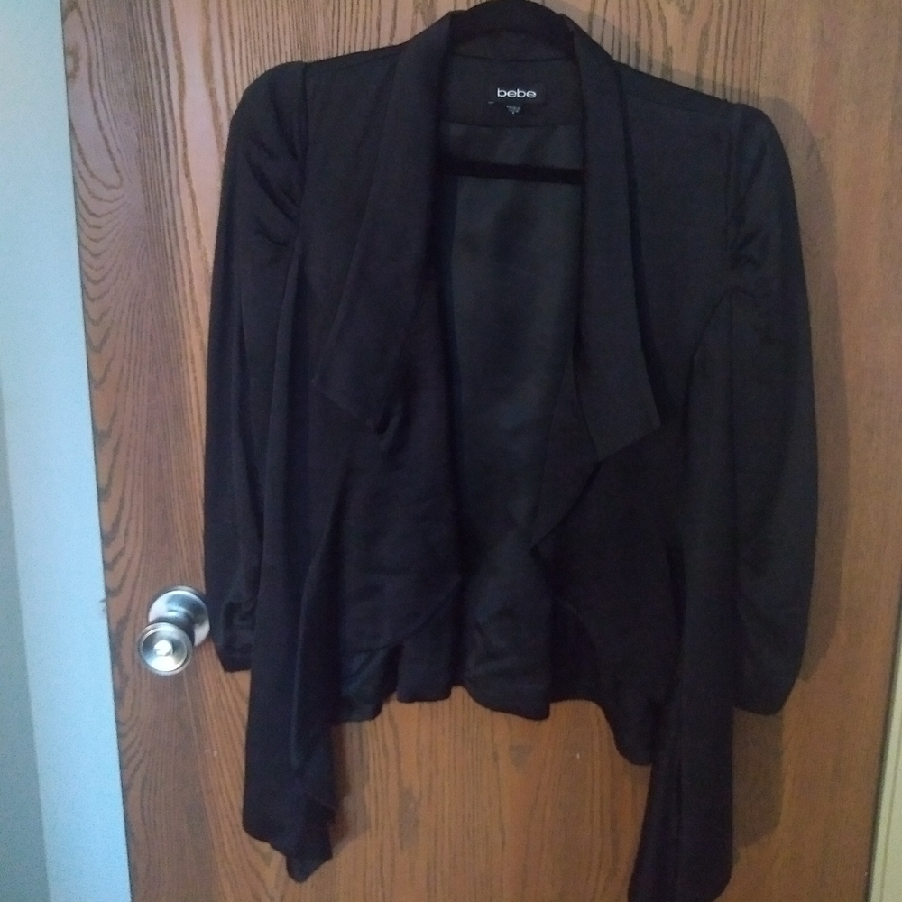 Bebe asymmetrical black evening blazer.